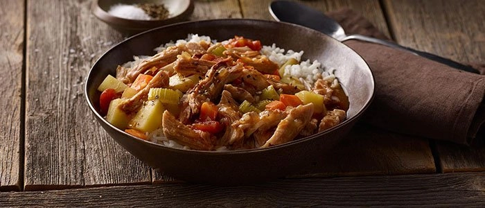 Pulled pork stew served over rice.